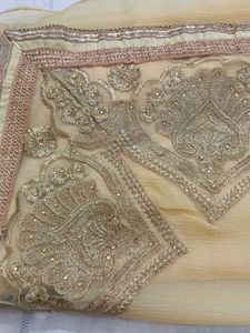 Elegant Gold Embroidered Saree