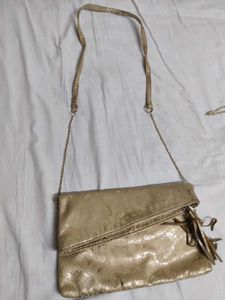 Gold Snake Print Sling Bag
