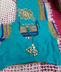 party wear saree firozi colour saree &amp; dark blue border with beautifu work as per showing in pic full length saree blouse size mention in pic