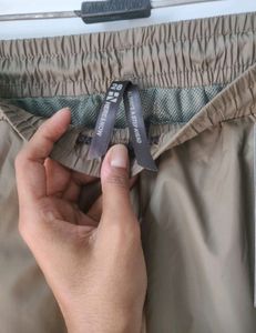 OLIVE PARACHUTE CARGO PANTS