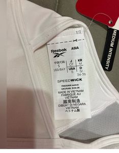 REEBOKWomen Sports lightly Padded Bra (White
