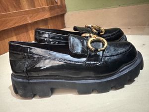Black Loafers with Gold Detail