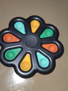 Simple Dimple Spinner Toy
