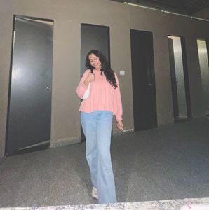 pink peplum top with jeans combo