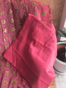 Pink Embroidered unstitched suit piece.