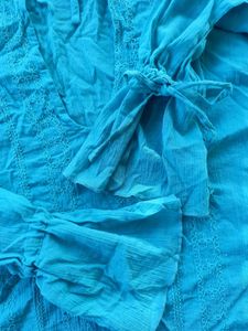 Light blue low-cut neck top