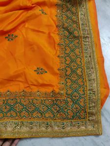 orange fancy saree - best saree for farewell, reception or night events