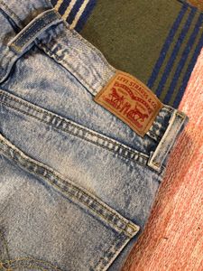 Levi’s High Rise Bootcut Raw Hem Jeans