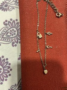 Charm Necklace with Heart, Key, Cross, and Lock