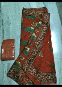 unusedElegant Orange Paisley Saree