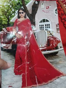 Elegant Red Saree with Gold Embroidery