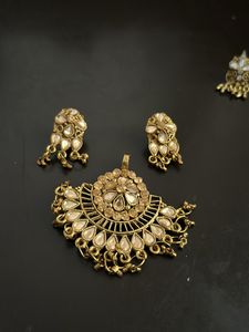 2 Sets Of Pendant And Earrings Golden Stonework
