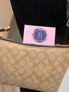 Signature Crossbody Bag