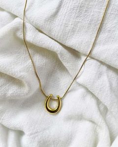 Gold Horseshoe Pendant Necklace