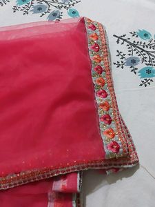 A beautiful grey lehenga with pink detailing