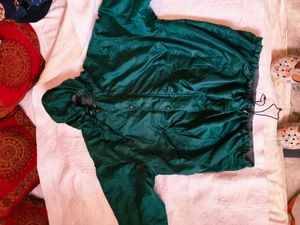 Green hooded windbreaker