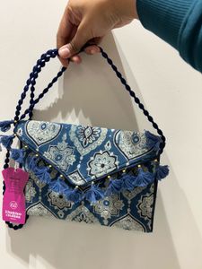 Patterned Clutch with Tassels