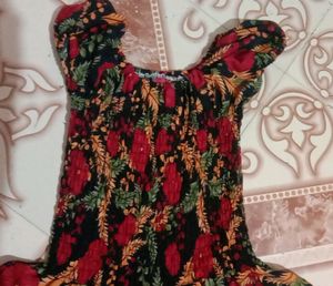 Beautiful Black Gown With Red And Green Design