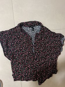A Crinkled Shirt From Forever 21 With Cap Sleeve
