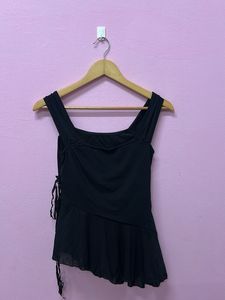 black asymmetrical top with zip on the side