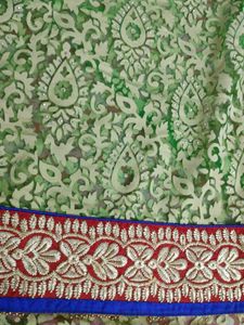 GREEN SAREE WITH RED BORDER