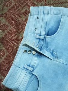 Ripped High-Waisted Jeans