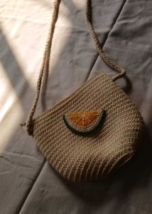 A sling purse