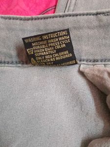 Grey Jeans with Red Stripe