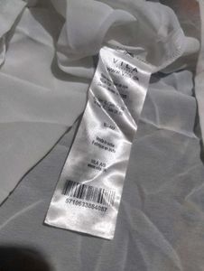 White Sleeveless Blouse