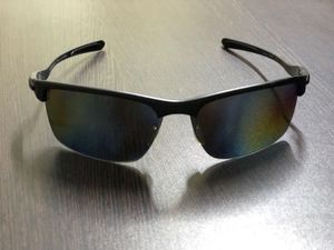 Oakley Carbon Fiber Frame Sleek Black Sunglasses