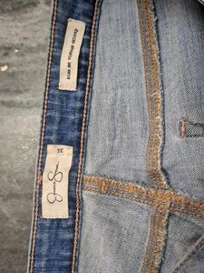 High Waisted Ripped Mom Jeans