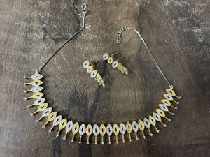 Silver And Gold Neck Set