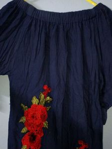A Beautiful Western Dress With Red Roses