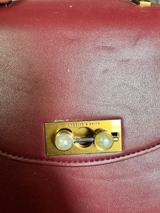 Charles &amp; Keith Burgundy Saddle Bag