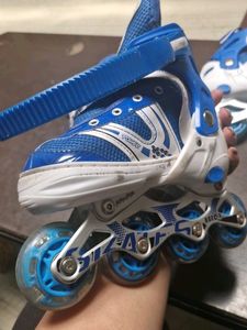Blue and White Roller Blades