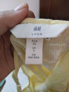 Ruffled Yellow Tank Top