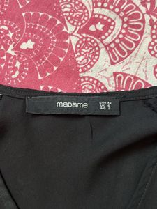 Madame Top