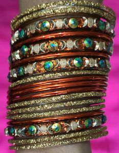 Orange And Golden Colour Bangles