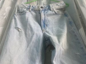 Light Wash Distressed Wide-Leg Jeans