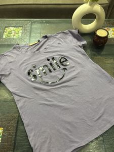 Perple Tshirt With “Smile” Stiker