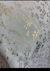 White dress with golden work