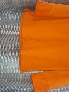 Color Tshirt With Folded Sleeves And Side Slit