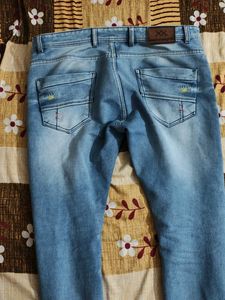 Distressed Denim Jeans