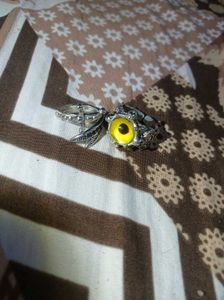 Uniquely Yellow Coloured Eye Silver Sword Ring