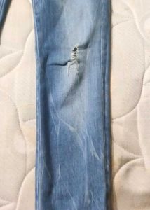 Light Wash Distressed Skinny Jeans