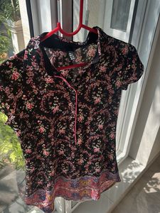 Floral Print Top bust is 18 inches