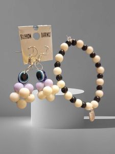 Handmade Evil Eye Pearl Earrings with Brace