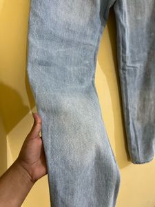 Ripped Light Wash Denim Jeans
