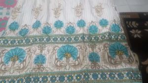 Elegant Embroidered Kurta in firozi colour