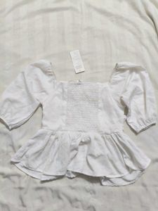 White Peplum Top